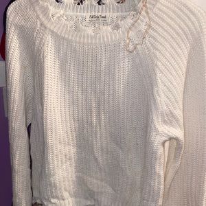 Sweater with rips